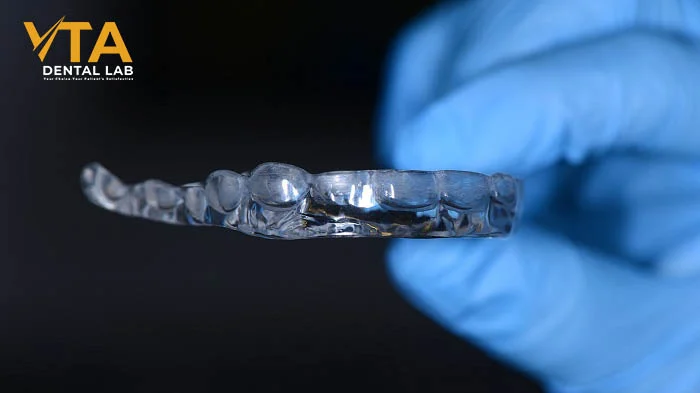 3D illustration of a hard occlusal guard covering the entire dental arch for maximum protection